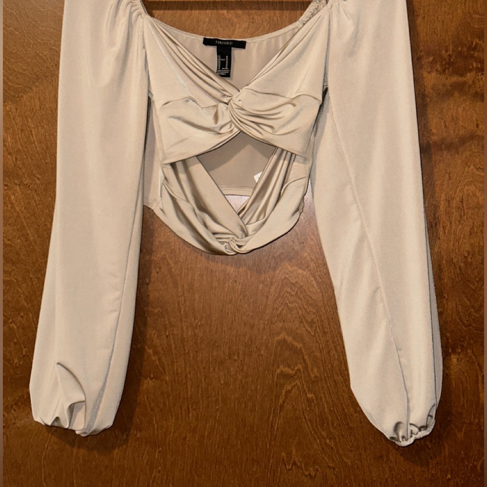 Forever 21 Cream / champagne cut out twist top with long sleeves